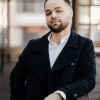 portrait-fashionable-well-dressed-man-with-beard-posing-outdoors_1328-3269