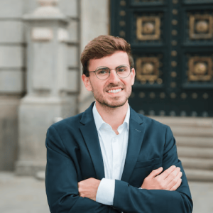 portrait-successful-young-businessman-with-his-arms-crossed-looking-camera_23-2148176207